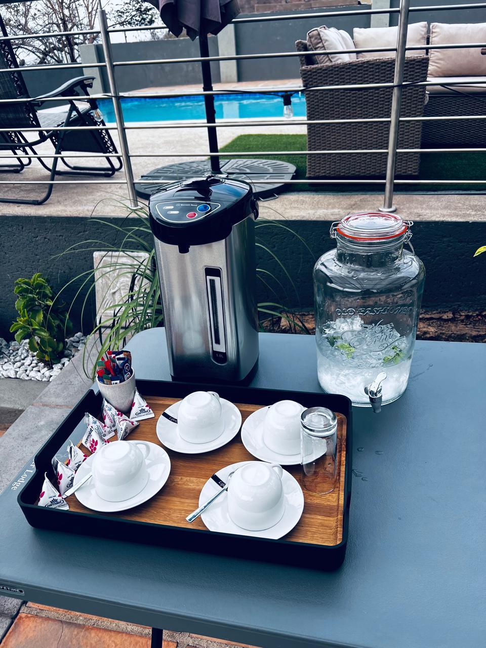 Tea and coffee station set up on the poolside terrace